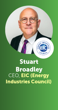 Portrait of Stuart Broadley, bald man wearing glasses, suit jacket, and patterned tie, CEO of the Energy Industries Council (EIC), with the EIC logo displayed next to his image.